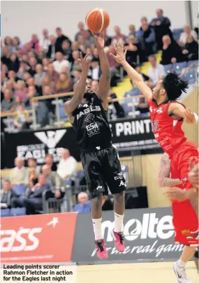  ??  ?? Leading points scorer Rahmon Fletcher in action for the Eagles last night