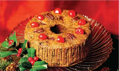  ?? (Dreamstime/TNS) ?? Stale jokes aside, the fruitcake has a long history that even predates Christmas itself.