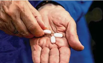  ?? New York Times file photo ?? For COVID, Paxlovid is given only if a prescripti­on can be filled within the first five days of symptom onset. Studies show that adults older than 65 benefit the most from taking the drug.