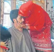  ?? WASEEM ANDRABI/HT PHOTO ?? A relative kisses Nasir Ahmad after his release by militants in south Kashmir's Midoora village of Awantipora in Pulwama district of Jammu &amp; Kashmir on Saturday