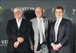  ?? AP PHOTO ?? Vegas Golden Knights coach Gerard Gallant is flanked by Bill Foley, left, owner, and George McPhee, general manager, in Las Vegas. McPhee certainly wouldn’t mind some Lady Luck to rub off on his NHL expansion franchise when it comes to the league’s...