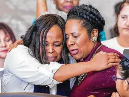  ?? Leslie Plaza Johnson ?? Demetria Smith and U.S. Rep. Sheila Jackson Lee share a tearful moment during the health care rally in Houston on Sunday, days after lawmakers took the first steps to repeal the Affordable Care Act.