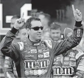  ?? [AP PHOTO] ?? Kyle Busch is introduced before the NASCAR Cup series All-Star race Saturday at Charlotte Motor Speedway in Concord, N.C.