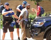  ?? RAY ARREDONDO ?? Kendrex White, 21, is taken into custody May 1 on the University of Texas campus in connection with a stabbing spree near the Gregory Gym. One 19-year-old student died; three others were hurt.
