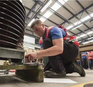  ??  ?? Graham Sutton untertakin­g one of the tasks set under the strutiny of ESB Judges in the last four of the ESB Apprentice of the Year awards held in Portlaoise last Thursday.