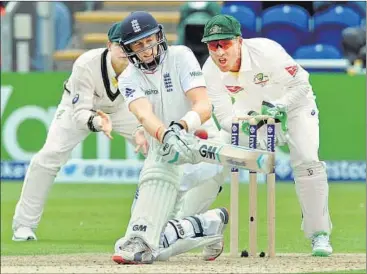  ?? AP PHOTO ?? Joe Root led England’s fightback, laying an excellent platform on the opening day of the Ashes series in Cardiff on Wednesday.