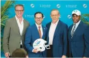  ?? MIKE STOCKER/SOUTH FLORIDA SUN SENTINEL ?? From left to right, Dolphins vice chairman, president and CEO Tom Garfinkel, coach Mike McDaniel, owner Stephen Ross and general manager Chris Grier in 2022 at Baptist Health Training Complex in Miami Gardens. Garfinkel spoke at Saturday’s Dolphins Challenge Cancer event about the organizati­on’s overall vision.