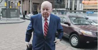  ?? SEAN KILPATRICK/ THE CANADIAN PRESS ?? Sen. Mike Duffy, a former member of the Conservati­ve caucus, arrives at the courthouse for his trial in Ottawa on Tuesday.