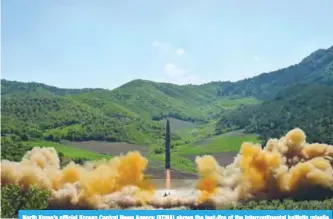  ??  ?? North Korea’s official Korean Central News Agency (KCNA) shows the test-fire of the interconti­nental ballistic missile Hwasong-14 at an undisclose­d location. —AFP