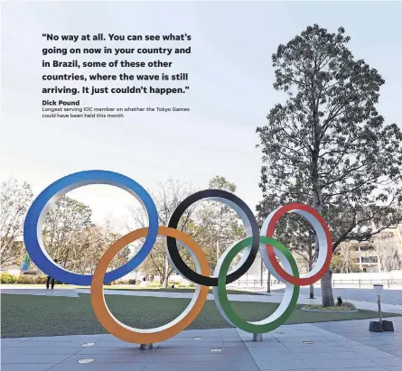  ??  ?? Japan was ready to show off the Olympic rings display at National Stadium in Tokyo. YUKIHITO TAGUCHI/ USA TODAY SPORTS