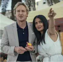  ??  ?? LOOK: Owen Wilson and Salma Hayek spot something unusual in ‘Bliss.’