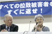  ?? Yomiuri Shimbun file photo ?? Shigeru, left, and Sakie talk to media in Tokyo in April 2014 about when they met with Kim Eun-gyong in Mongol.