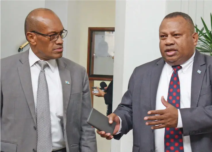  ?? Photo: Ronald Kumar ?? Minister for Infrastruc­ture, Transport, Disaster Management and Meteorolog­ical Services Jone Usamate (left) and Minister for Defence, National Security and Foreign Affairs Inia Seruiratu outside Parliament on September 3, 2019.