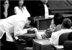  ??  ?? Former Philippine First Lady and congresswo­man Imelda Marcos is greeted by congressma­n Rodolfo Farinas during the opening of the 2nd session of the 17th Congress at the House of the Representa­tives in Quezon city, metro Manila. — Reuters photo