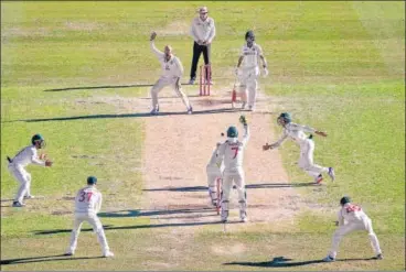  ?? AFP ?? Skipper Ajinkya Rahane thwarts Nathan Lyon as Aussies tighten the noose around India in the third Test at SCG.