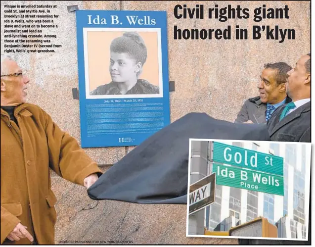  ?? THEODORE PARISIENNE/FOR NEW YORK DAILY NEWS ?? Plaque is unveiled Saturday at Gold St. and Myrtle Ave. in Brooklyn at street renaming for Ida B. Wells, who was born a slave and went on to become a journalist and lead an anti-lynching crusade. Among those at the renaming was Benjamin Duster IV (second from right), Wells’ great-grandson.