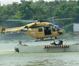  ?? — PTI ?? Armed forces take part in a multi-agency exercise ‘Pralay Sahayam’ conducted at Hussainpur Sagar lake in Hyderabad on Saturday.