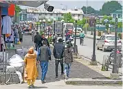  ?? (aFP) ?? A CCTV camera is seen installed outside a shop in Srinagar on May 5