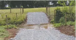  ?? BY DAVID MASSIE ?? A typical graded stream-crossing allows for livestock and equipment movement between fenced grazing fields.