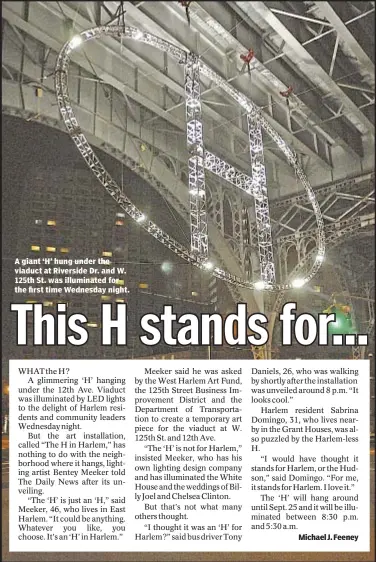  ??  ?? A giant ‘H’ hung under the viaduct at Riverside Dr. and W. 125th St. was illuminate­d for the first time Wednesday night.