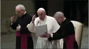  ?? ALESSANDRA TARANTINO — THE ASSOCIATED PRESS ?? Pope Francis delivers his blessing at the end of his general audience in the Paul VI Hall at the Vatican on Wednesday.