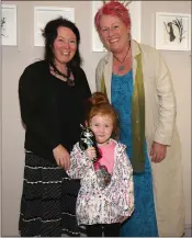  ??  ?? Martina and Dearbhla Furlong with artist Kate Tyrrell at the offical opening of Kate’s exhibition ‘Found’ at the Presentati­on Centre, Enniscorth­y.