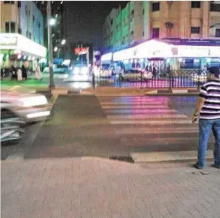  ?? Vimala Benjamin Desouza ?? A pedestrian crossing in Sharjah is difficult to use as the road has a lot of fast- moving traffic and there are no traffic lights to stop the vehicles.