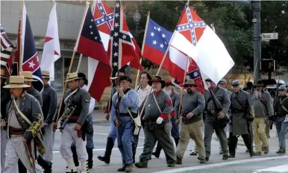  ?? Horvath Davidson/AP ?? Sons of Confederat­e Veterans members and others march through downtown Shreveport, Louisiana, on 3 June 2011. Photograph: Val