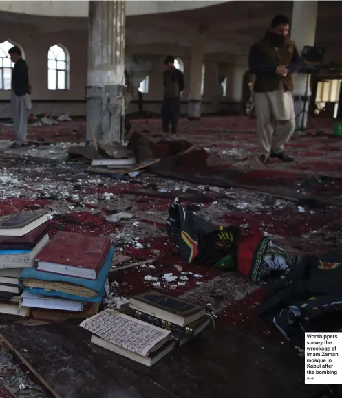  ?? AFP ?? Worshipper­s survey the wreckage of Imam Zaman mosque in Kabul after the bombing