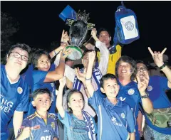  ?? PATTARAPON­G CHATPATTAR­ASILL ?? Thai fans watch the game at the King Power Complex.