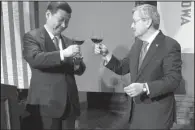  ?? AP ?? Xi Jinping, China’s vice president at the time, and Iowa Gov. Terry Branstad share a toast at a dinner in Des Moines in 2012. Branstad, announced Wednesday as Donald Trump’s selection as the new U.S. ambassador to China, was hailed by a Chinese...