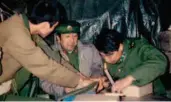  ??  ?? Cai Ruikang (right) treated soldiers in caves along the trenches at the frontlines after conflict broke out on China’s southern borders in the late 1970s.