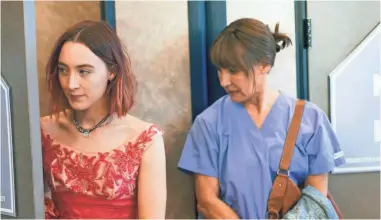  ?? MERIE WALLACE/A24 ?? Laurie Metcalf and Saoirse Ronan play a battling mother and daughter who show their love for each other in complicate­d ways in “Lady Bird.”