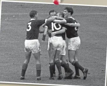  ?? ?? (From left) Eric Caldow, Pat Crerand, Davie Wilson and Jim Baxter congratula­te Denis Law (No. 10) after he had scored against Czechoslov­akia