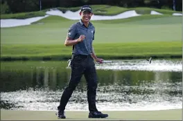  ?? PHELAN M. EBENHACK — THE ASSOCIATED PRESS ?? Collin Morikawa celebrates after putting on the 18th green to win the Workday Championsh­ip on Sunday in Bradenton, Fla.