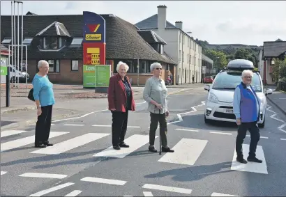  ?? T16 Zebra crossing ?? Last September we photograph­ed Agnes Morris, Elspeth Kerr, Betty Nudds and Riona MacEwan, who all live close to the crossing near Lynn Court at the then new zebra crossing which a concerned resident has said may have to be removed.