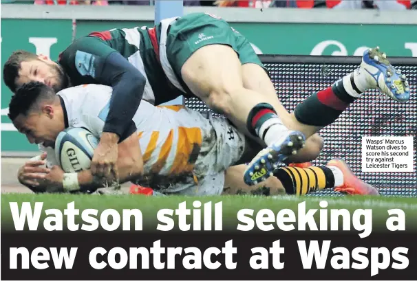  ??  ?? Wasps’ Marcus Watson dives to score his second try against Leicester Tigers