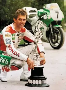  ??  ?? Right: Nick finally took victory in a TT in 1993, winning the F1 race on a Castrol Honda RC30