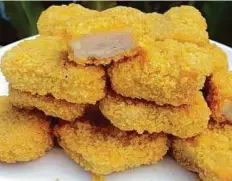  ??  ?? A municipali­ty official said all types of nuggets prepared in local factories in the UAE are subjected to control.