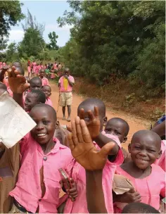  ??  ?? CHILDREN ON their way home from school in Nasenyi.