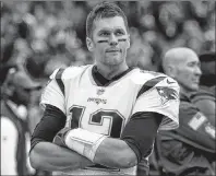  ?? AP PHOTO ?? New England Patriots quarterbac­k Tom Brady watches from the sidelines after leaving the game in the second half of the Patriots’ 34-10 loss Sunday to the Tennessee Titans in Nashville, Tenn.