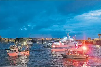  ?? ?? LICENCES: French fishing boats block the entrance to the western port of Saint-Malo.