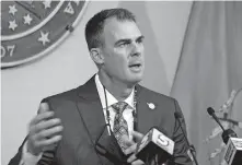  ?? [SUE OGROCKI/ THE ASSOCIATED PRESS] ?? Oklahoma Gov. Kevin Stitt speaks during a news conference Thursday in Oklahoma City. Stitt said again that he will not issue a statewide mask mandate, despite a recommenda­tion from the White House Coronaviru­s Task Force.