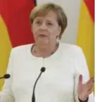  ?? FOTO EPA-EFE ?? Bondskanse­lier Merkel bevindt zich tussen twee vuren.