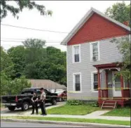 ??  ?? The South Street home where a woman and her daughter were found dead is near the Glens Falls Post Office and a short distance from Glens Falls Hospital.