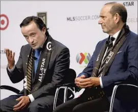  ?? Al Seib Los Angeles Times ?? LIGA MX President Mikel Arriola, left, and MLS Commission­er Don Garber announce the MLS All-Star game will be played at Banc of California Stadium.