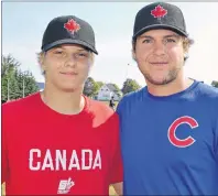  ?? ERIC MCCARTHY/JOURNAL PIONEER ?? Noah Baker, left, and Brady Hogg went from celebratin­g a Canadian championsh­ip win Sunday afternoon in O’Leary to joining 28 other athletes from across Canada Sunday evening in trying out for the Canadian junior men’s team.