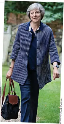  ??  ?? Bags of style: Kate Moss with a Longchamp handbag from her own collection; Theresa May and her trendy backpack P N L / D I M R A I D C A M R E T P : e r u t c i P