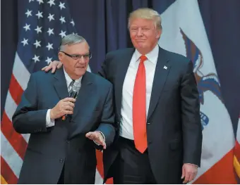  ??  ?? Donald Trump with Arizona sheriff Joe Arpaio at a campaign rally in Iowa, January 2016