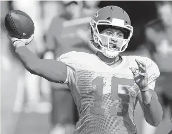  ?? Charlie Riedel / Associated Press ?? Chiefs quarterbac­k Patrick Mahomes is scheduled to play the first quarter against the Texans in the preseason opener but could push for more playing time if he doesn’t find the end zone.